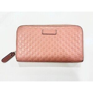 Gucci Pink GG Embossed Leather Zip Wallet